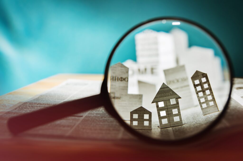 Paper House Under A Magnifying Lens